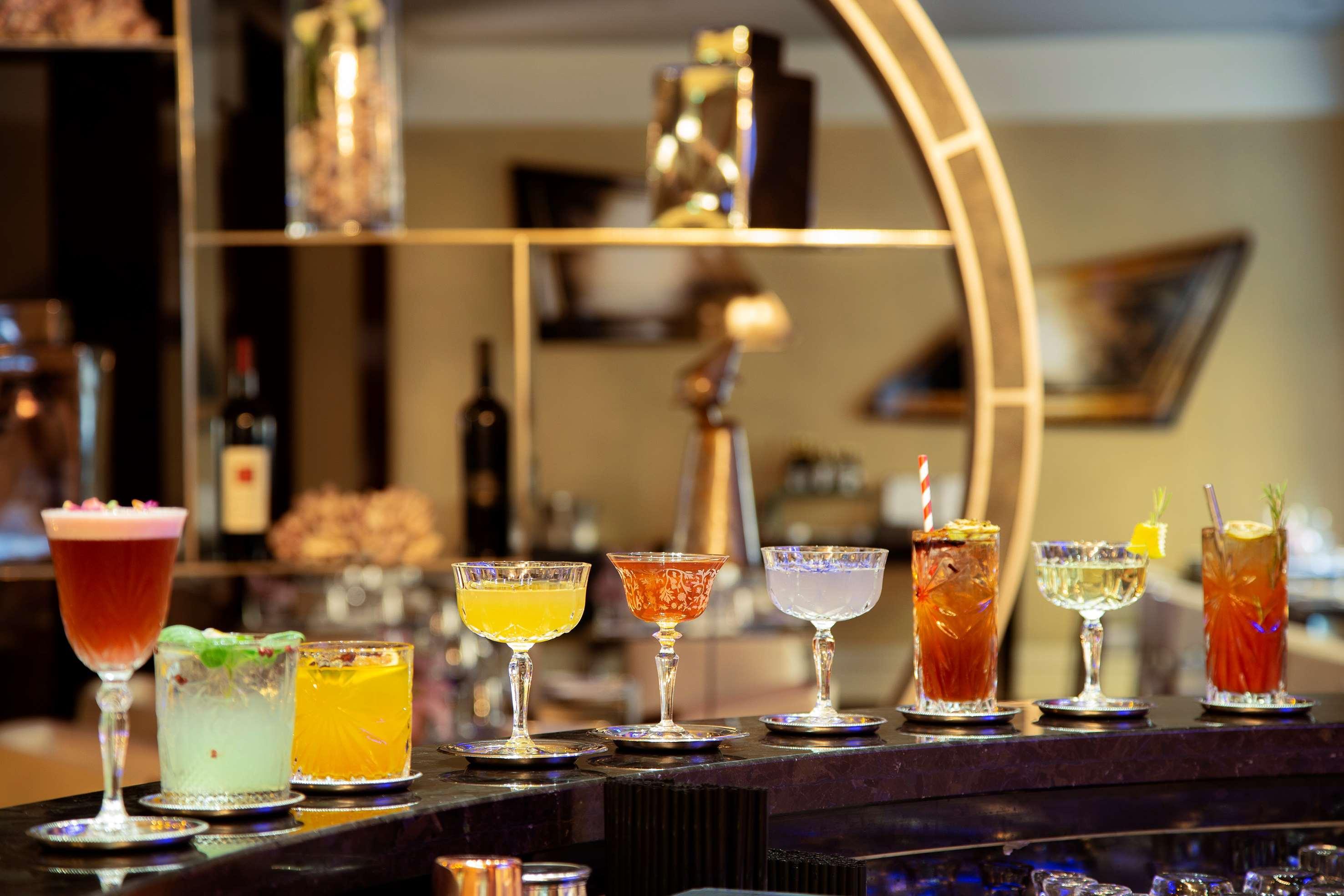 โรงแรมเมเลีย เจโนวา เจนัว ภายนอก รูปภาพ A selection of cocktails